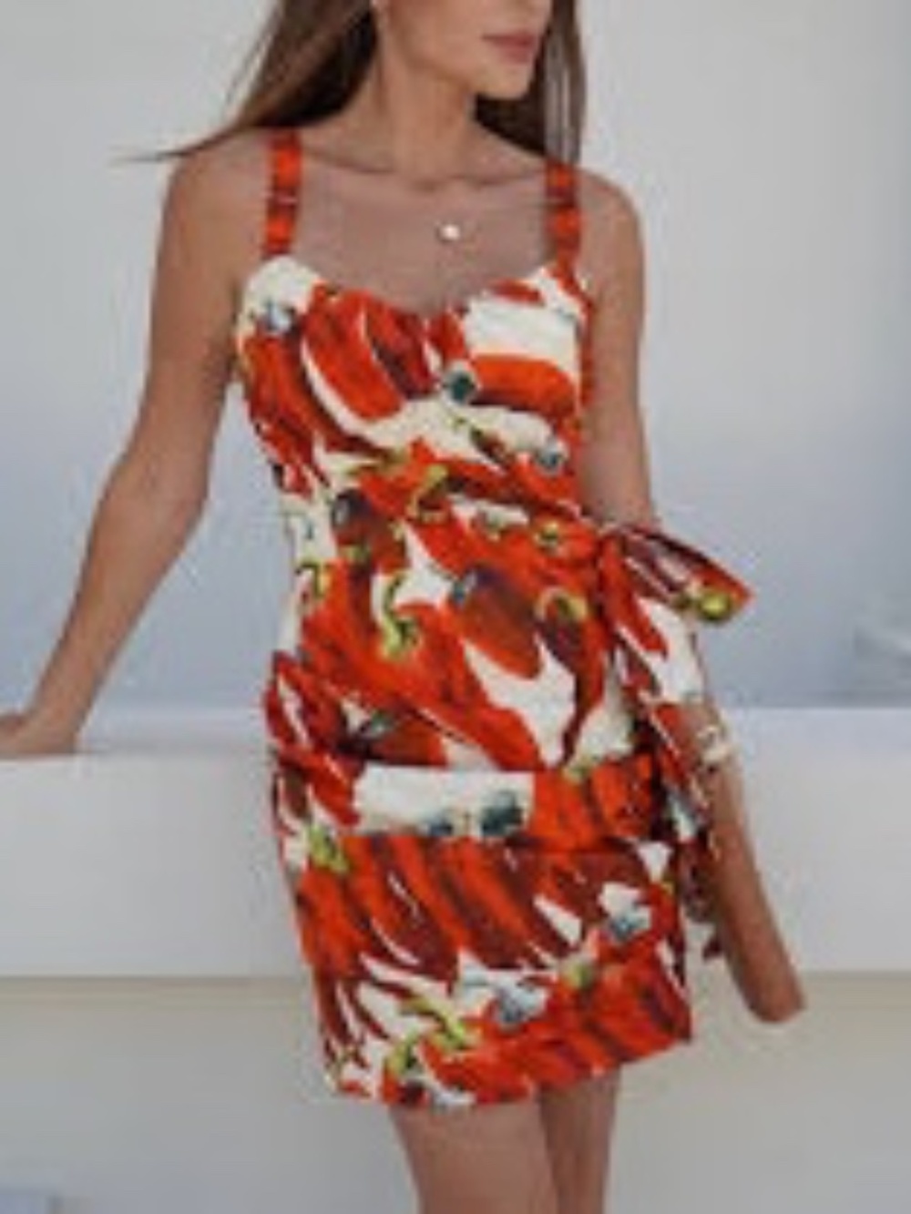 Red chili pepper print ruched mini dress featuring a side bow accent - Picture 4 of 10